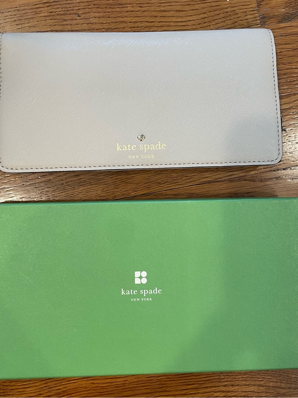 kate spade cream leather continental wallet with gold logo